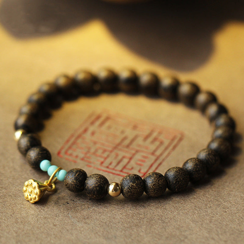 KarmaRipple's Agarwood Lotus Strength Bracelet p1