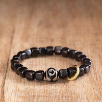 KarmaRipple's Tibetan Ebony Wood Dzi Bead Balance Calm Bracelet