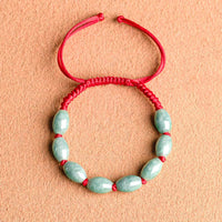 KarmaRipple's Jade Fortune Red String Bracelet