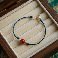 KarmaRipple's Handmade String Cinnabar Buckle Blessing Bracelet