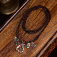 KarmaRipple's Tibetan Medicine Buddha Compassion Woven Rope Pendant Necklace
