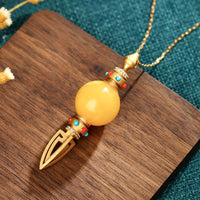 KarmaRipple's 24K Gold Plated Amber Dorje Vajra Clear Anxiety Pendant Necklace