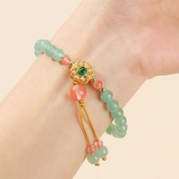 KarmaRipple's Green Aventurine Fortune Bead Tassel Bracelet
