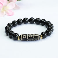 KarmaRipple's Tibetan Nine-Eye Dzi Bead Black Onyx Power Bracelet