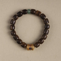 KarmaRipple's Agarwood Bronze Coin Auspicious Cloud Calm Bracelet