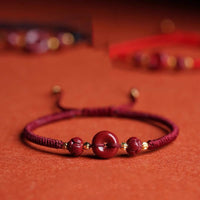 KarmaRipple's Handmade Cinnabar Peace Buckle Lotus Calm Blessing Woven Rope Bracelet