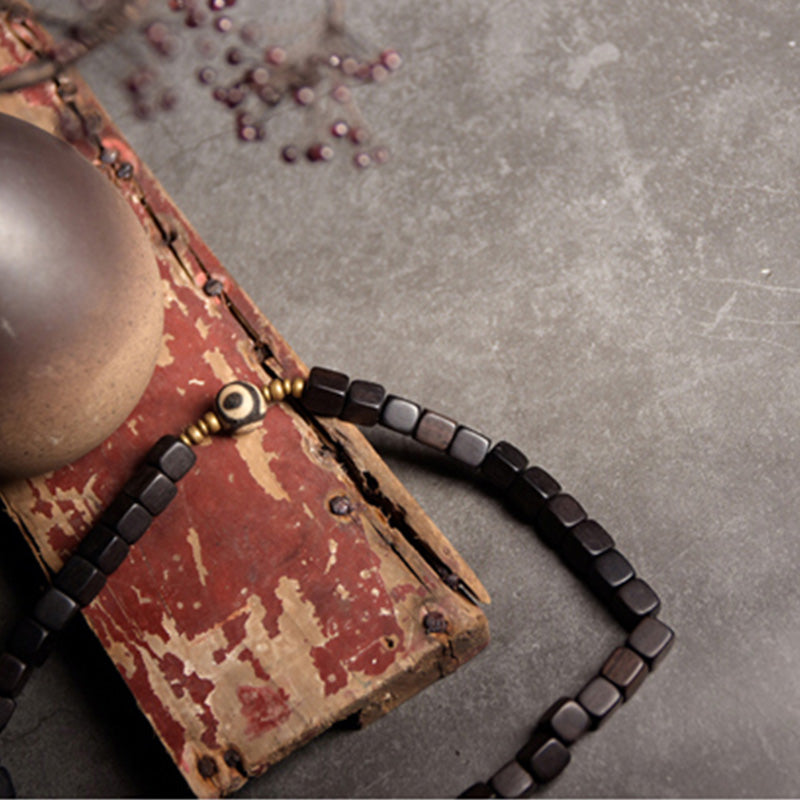 KarmaRipple's Ebony Wood Dzi Bead Bronze Peace Pair Bracelet p5